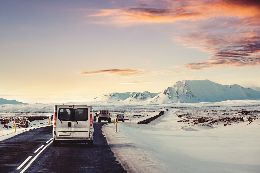 An Iceland winter road trip with RV campervans on a country road